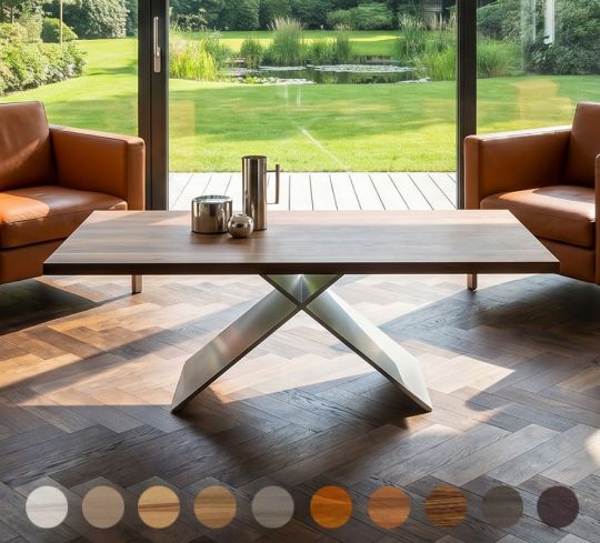 Design Couchtisch nach Maß aus Buchenholz und mit Mittelgestell aus Edelstahl in X-Form